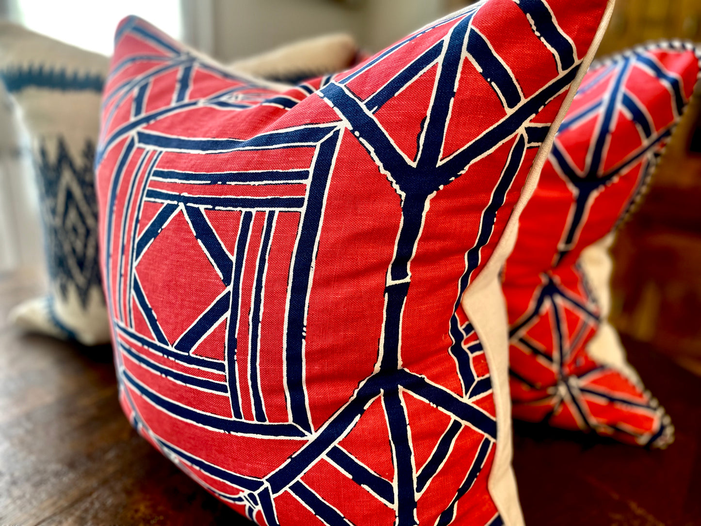 Pagoda red and blue bamboo print with striped blue welt and white linen back