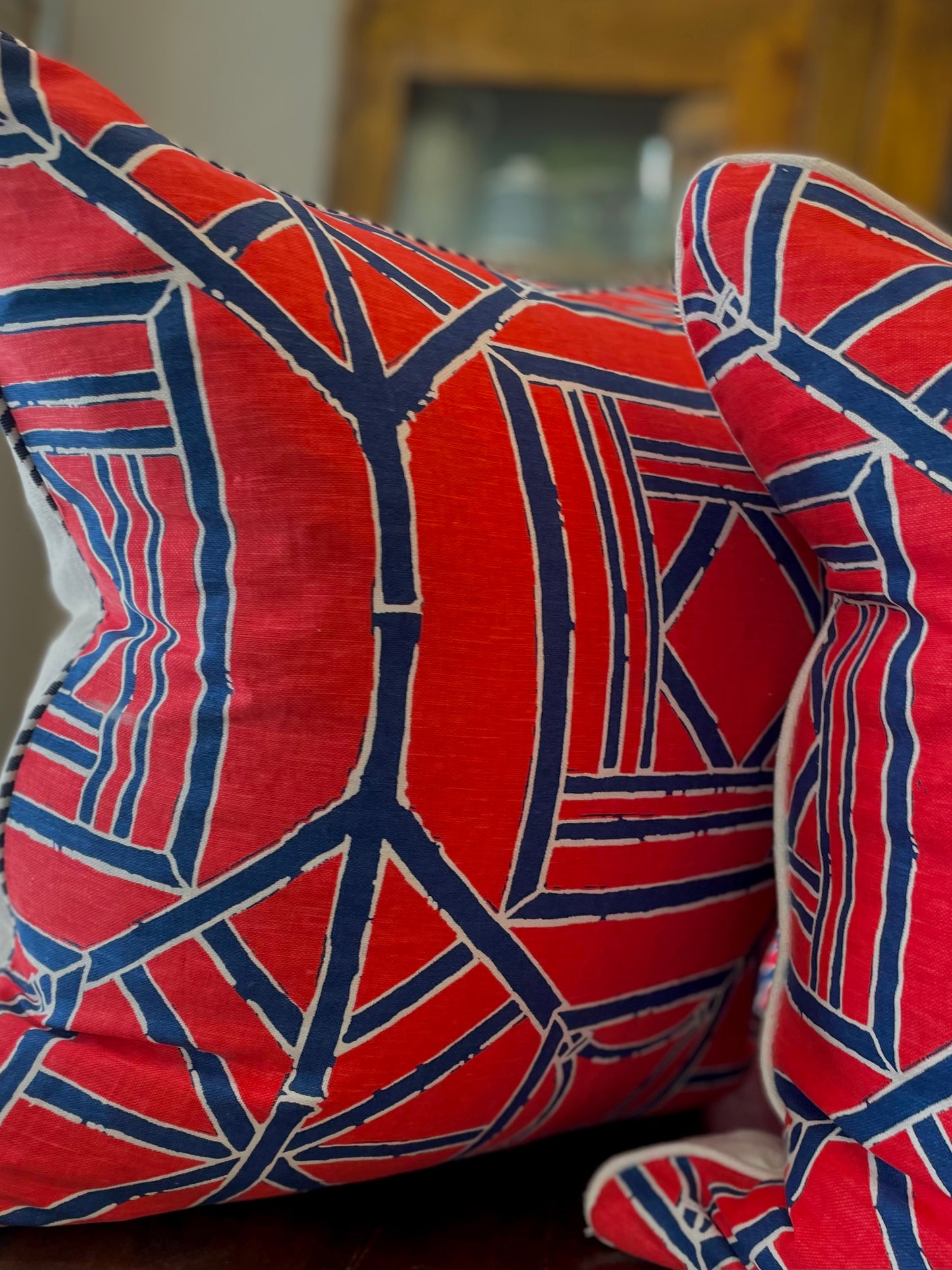 Pagoda red and blue bamboo print with striped blue welt and white linen back
