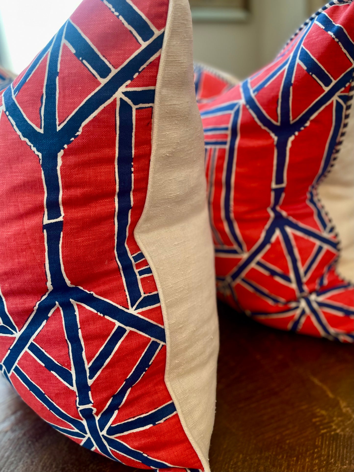 Pagoda red and blue bamboo print with striped blue welt and white linen back